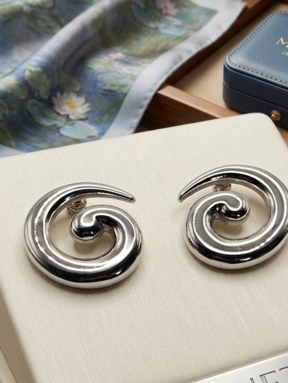 Monet Polished Silver Spiral Post Earrings - Picture 2 of 15